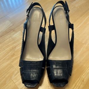 Women’s size 11 Nine West 5” heels. Worn a few times and in great condition!